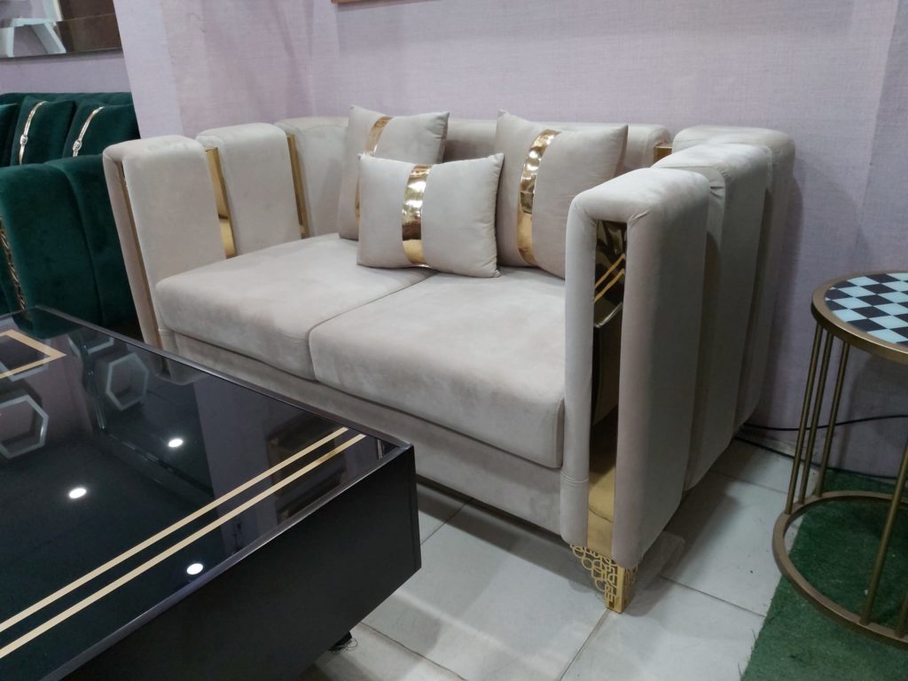 Brass arm sofa