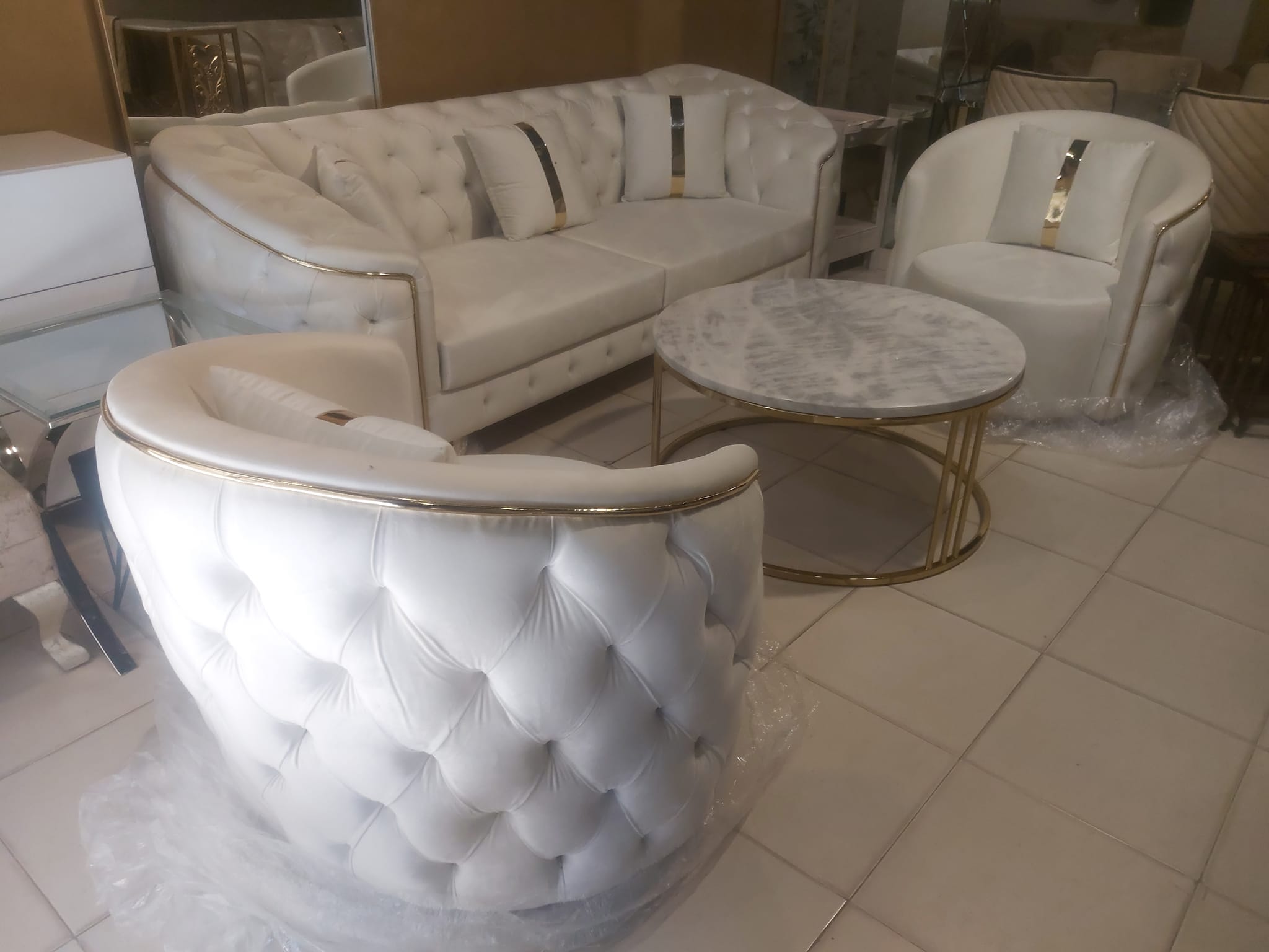 White rexine sofa