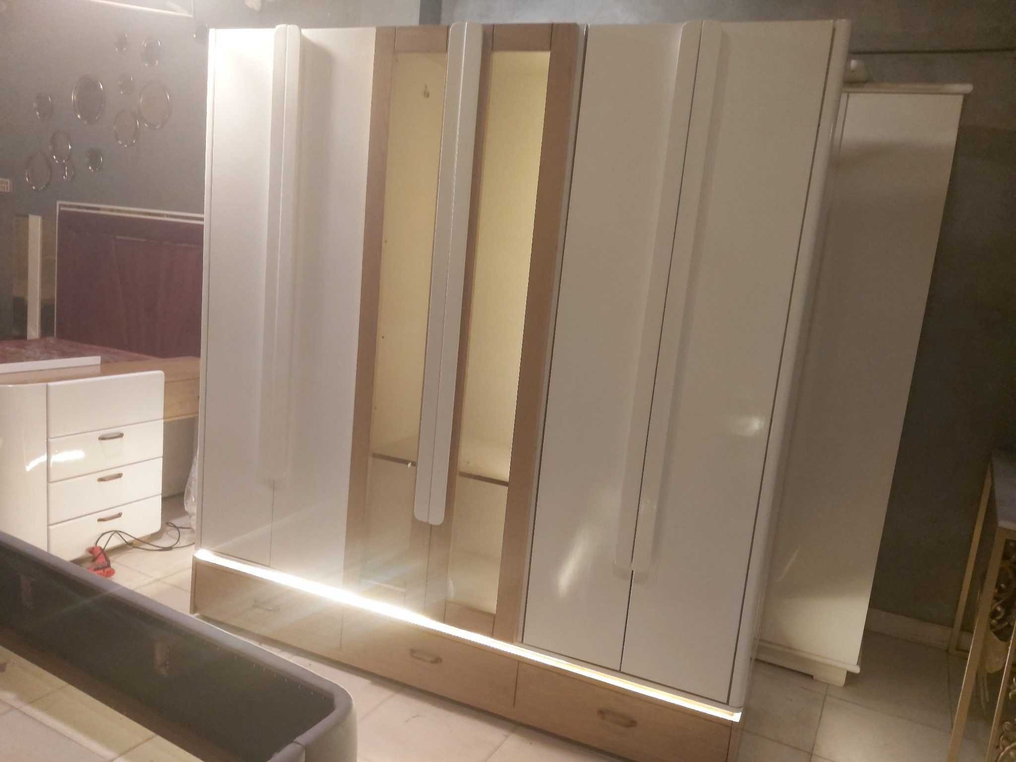Modern wooden wardrobe along with lighting work